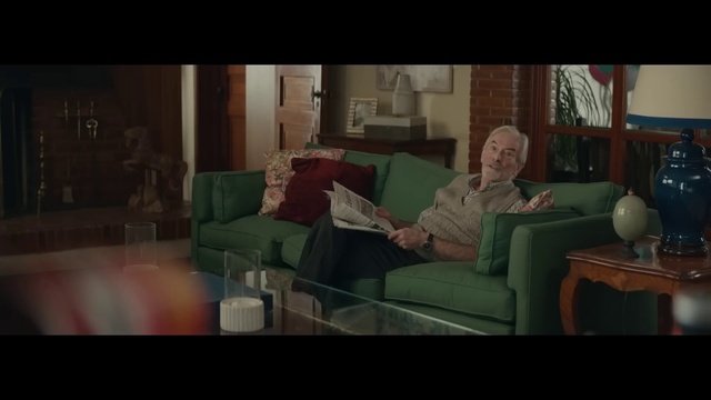 Video Reference: Couch, Furniture, Table, Comfort, Interior design, Flash photography, Living room, Darkness, Event, Coffee table