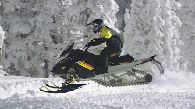 Video Reference: Snow, Snowmobile, Helmet, Sports equipment, Vehicle, Automotive tire, Sports gear, Slope, Racing, Winter sport