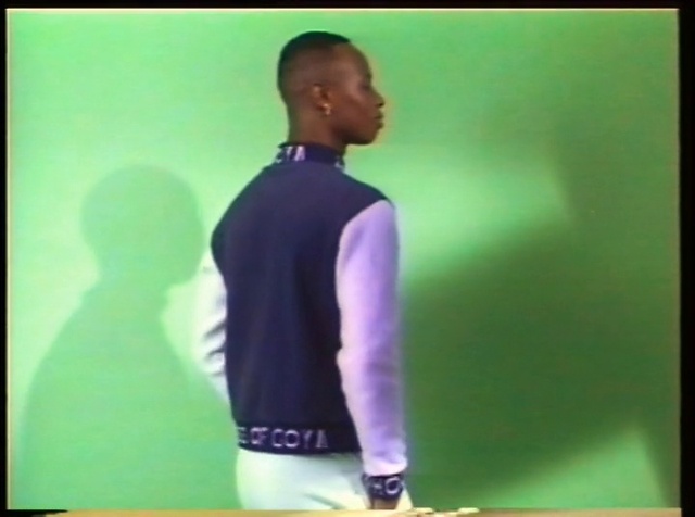 Video Reference: Sleeve, Gesture, Waist, T-shirt, Elbow, Sportswear, Jersey, Gadget, Electronic device, Fashion design