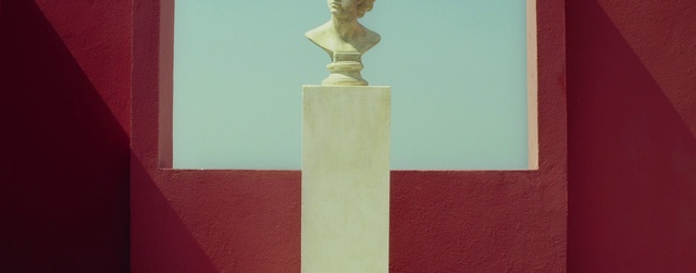 Video Reference: Pedestal, Wood, Sculpture, Rectangle, Art, Artifact, Statue, Tints and shades, Religious item, Column