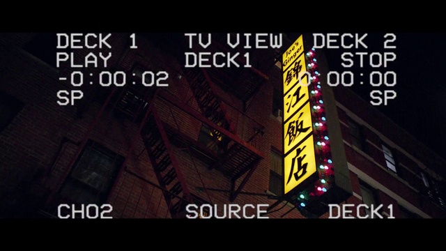 Video Reference: Building, Font, Facade, Triangle, City, Darkness, Event, Advertising, Brand, Graphics