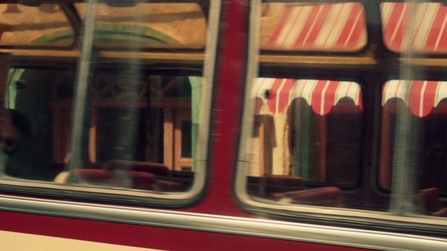 Video Reference: Train, Automotive lighting, Rectangle, Motor vehicle, Vehicle, Material property, Automotive exterior, Automotive design, Tints and shades, Wood