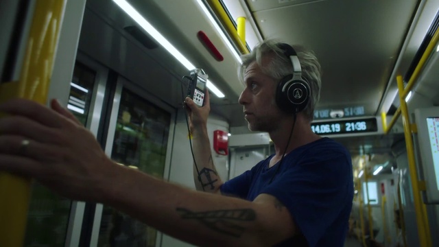 Video Reference: Gesture, Elbow, T-shirt, Fun, Wrist, Eyewear, Headphones, Chest, Service, Audio equipment