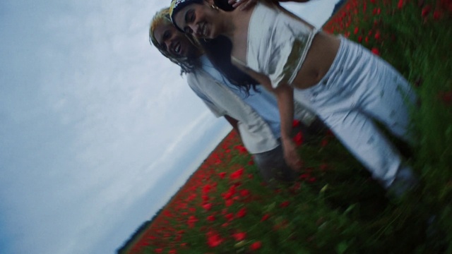 Video Reference: Plant, Smile, Cloud, Flash photography, People in nature, Happy, Gesture, Grass, Sky, Sunglasses
