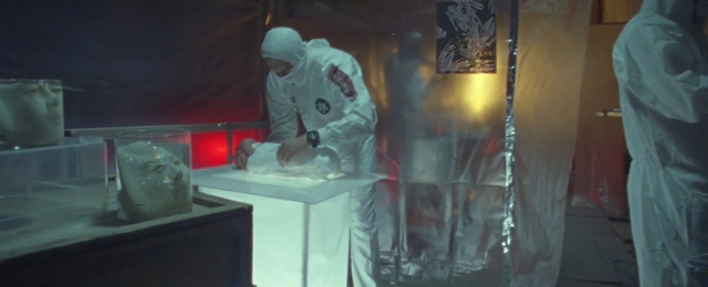 Video Reference: Gas, Sleeve, Hat, Automotive lighting, Personal protective equipment, Entertainment, Table, Science, Display case, Darkness