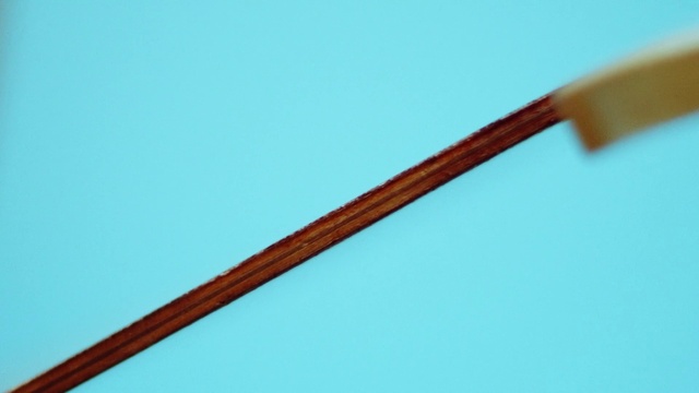 Video Reference: Musical instrument, Wood, Electric blue, flute, Wind instrument, Font, Office supplies, Art, Pencil, Titanium