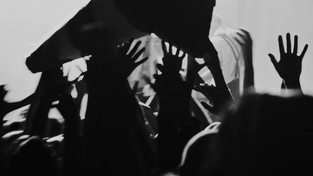 Video Reference: Hand, Sleeve, Finger, Gesture, Style, Black-and-white, Thumb, Font, Nail, Monochrome