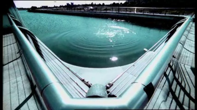 Video Reference: Water, Hood, Nature, Body of water, Aqua, Landmark, Building, Metropolitan area, Bridge, Leisure