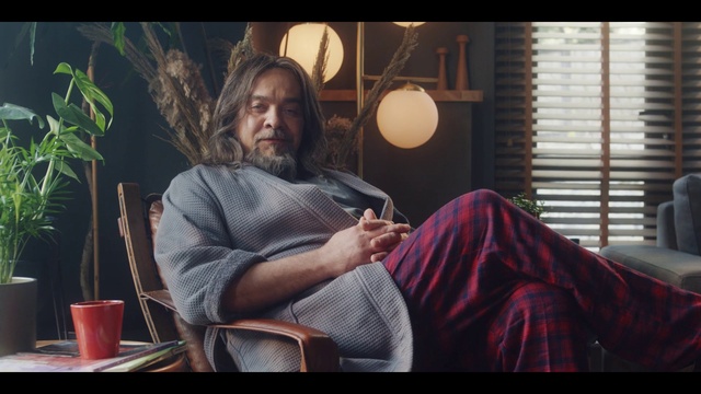 Video Reference: Hairstyle, Shoulder, Comfort, Flowerpot, Plant, Flash photography, Window blind, Beard, Tableware, Houseplant