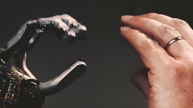 Video Reference: Hand, Human, Musical instrument, Guitar accessory, Flash photography, Microphone, Gesture, Musician, Finger, Nail