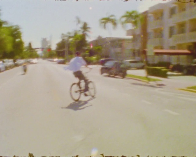 Video Reference: Bicycle, Wheel, Tire, Bicycle tire, Sky, Bicycle wheel, Road surface, Asphalt, Font, Mode of transport
