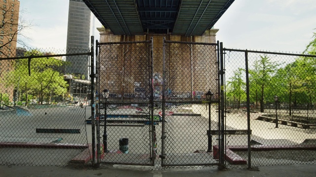 Video Reference: Plant, Sky, Building, Fence, Tree, Mesh, Road surface, Wire fencing, Urban design, Residential area