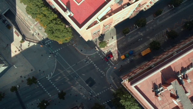 Video Reference: Property, Building, Road surface, Plant, Tree, Urban design, Thoroughfare, Neighbourhood, Asphalt, Residential area