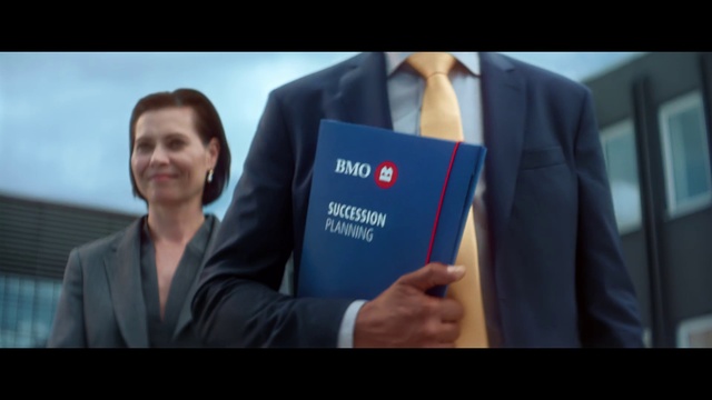 Video Reference: Smile, Sleeve, Gesture, Collar, Blazer, Font, White-collar worker, Suit, Formal wear, Electric blue