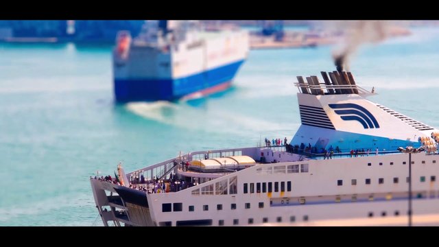 Video Reference: ferry, passenger ship, boat, sea, harbor, transportation, travel, water, deck, smoke, maritime, vessel, ocean, port, ship