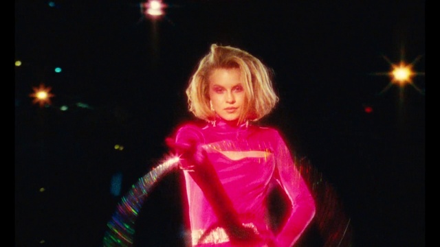 Video Reference: Flash photography, Artist, Music, Performing arts, Music artist, Entertainment, Musician, Fashion design, Magenta, Music venue