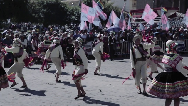 Video Reference: Flag, Tartan, Crowd, Event, Public event, Uniform, Pole, Tradition, Festival, Rebellion