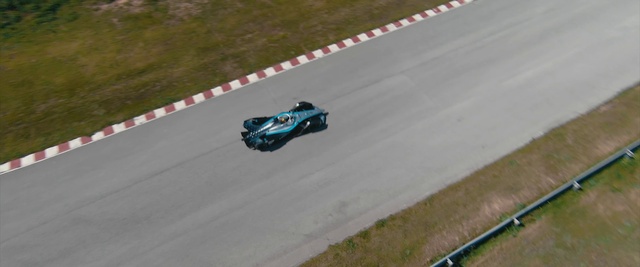 Video Reference: Land vehicle, Tire, Vehicle, Wheel, Car, Automotive tire, Automotive design, Asphalt, Formula one car, Racing