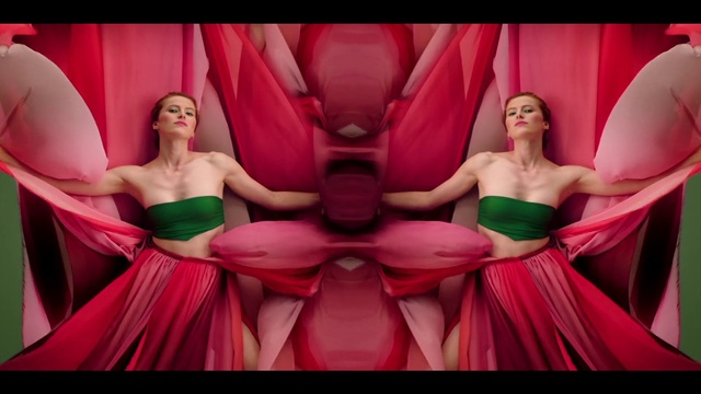 Video Reference: Mythical creature, Facial expression, Muscle, Purple, Organ, Green, Human body, Lighting, Petal, Pink