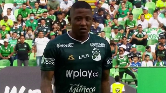 Video Reference: Sports uniform, Sports jersey, Jersey, Green, Player, Gesture, Fan, World, Sportswear, T-shirt