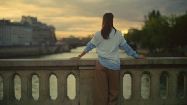 Video Reference: Sky, Cloud, Flash photography, Temple, Happy, Standing, Lighting, Body of water, Fence, Gesture