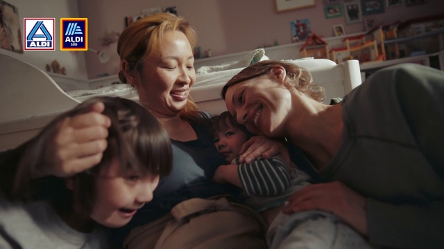 Video Reference: Hair, Hand, Mouth, Smile, Mammal, Flash photography, Gesture, Happy, Interaction, Bookcase