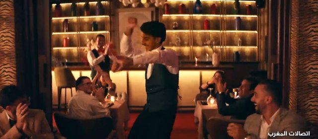 Video Reference: restaurant, waiter, dance, diners, clapping, bar, interior, warm lighting, hospitality, celebration, nightlife, performance