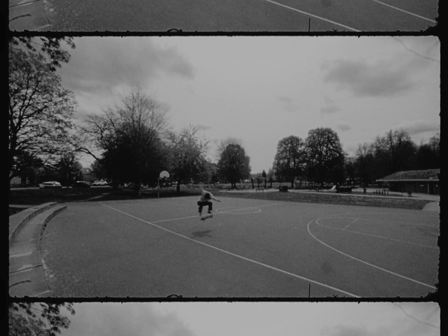 Video Reference: Sky, Plant, Cloud, Infrastructure, Tree, Asphalt, Black-and-white, Style, Tennis, Monochrome