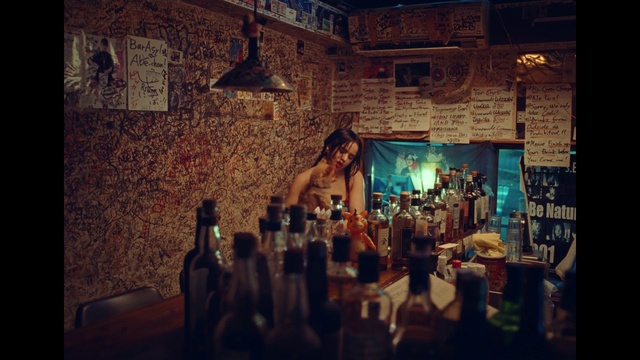 Video Reference: Bottle, Drinking establishment, Barware, Drinkware, Sky, Tableware, Art, Drink, Event, Wine