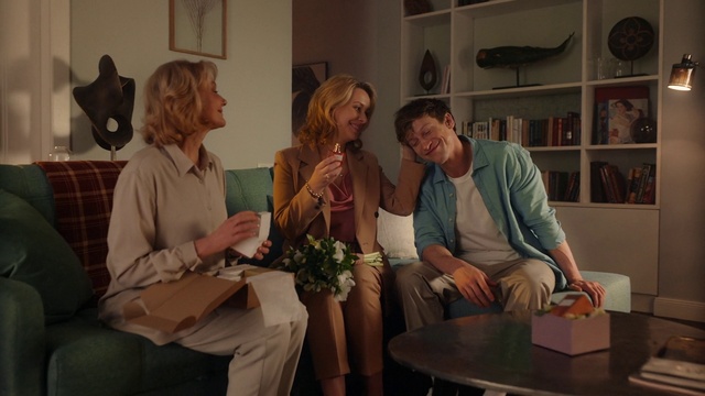 Video Reference: Picture frame, Furniture, Leg, Comfort, Smile, Couch, Table, Shelf, Bookcase, Event