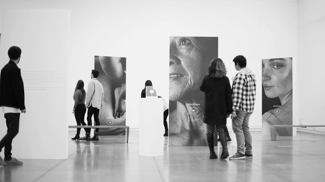 Video Reference: Photograph, White, Black, Standing, Black-and-white, Style, Art, Sculpture, Automotive design, Event