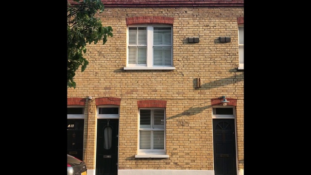 Video Reference: Window, Fixture, Building, Wood, Brick, Brickwork, Rectangle, Residential area, Neighbourhood, Building material
