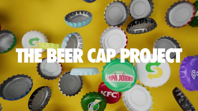 Video Reference: Yellow, Cake decorating supply, Font, Circle, Logo, Bottle cap, Sweetness, Graphics, Automotive wheel system, Gear