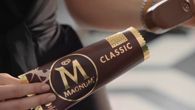 Video Reference: Sleeve, Gesture, Automotive design, Drink, Font, Wrist, Bicycle part, Tints and shades, Nail, Fashion accessory