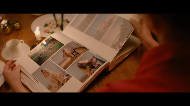 Video Reference: Table, Publication, Automotive design, Space, Font, Art, Book, Event, Paper, Room