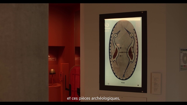 Video Reference: Wood, Font, Art, Tints and shades, Fixture, Event, Circle, Visual arts, Graphics, Room