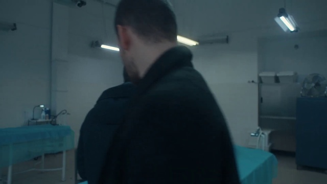 Video Reference: Sleeve, Darkness, Room, Fun, Ceiling, Audio equipment, Hoodie, T-shirt, Facial hair, Beard