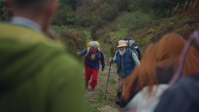 Video Reference: Plant, Natural landscape, Luggage and bags, Hiking equipment, Walking stick, People in nature, Bag, Leisure, Backpack, Grassland