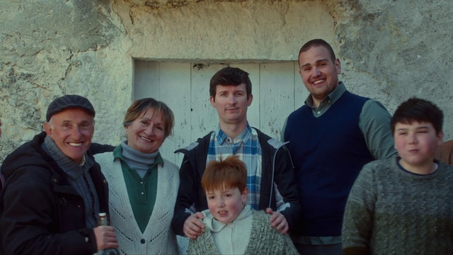 Video Reference: Face, Smile, Head, Outerwear, Eye, Organ, Standing, Iris, Jacket, T-shirt