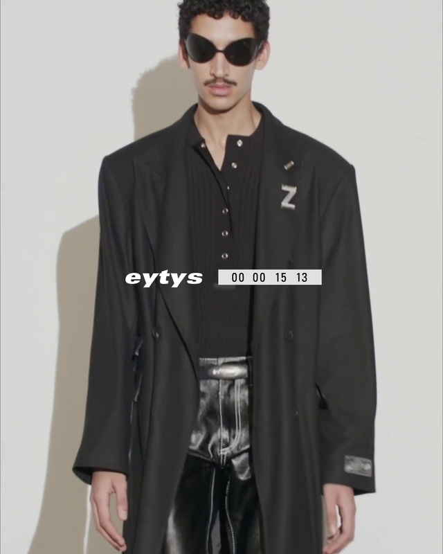 Video Reference: Outerwear, White, Black, Vision care, Sleeve, Dress shirt, Street fashion, Eyewear, Waist, Drinkware