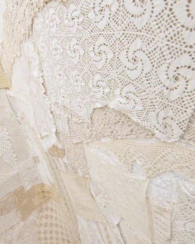 Video Reference: Brown, Beige, Textile, Embellishment, Wood, Grey, Flooring, Tablecloth, Bridal accessory, Art