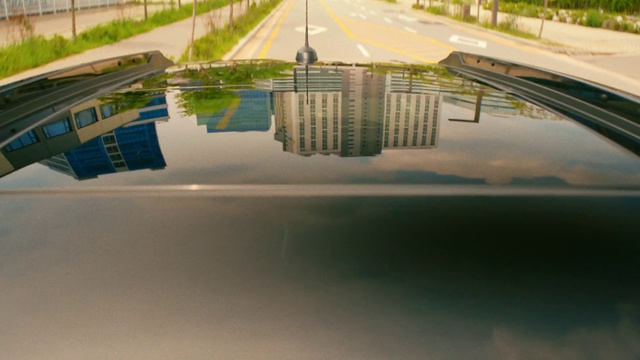 Video Reference: Water, Daytime, Sky, Plant, Line, Urban design, Grass, Landscape, City, Lake