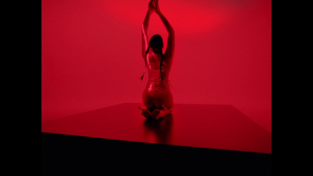 Video Reference: Arm, Leg, Human body, Dress, Flash photography, Entertainment, Performing arts, Knee, Rectangle, Magenta