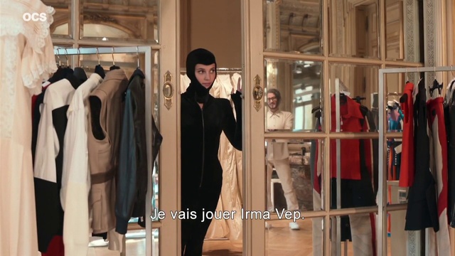 Video Reference: Fashion, Sleeve, Hat, Fashion design, Retail, Event, Formal wear, Clothes hanger, Boutique, Room