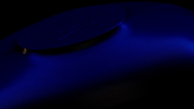Video Reference: Dishware, Hood, Gadget, Collar, Font, Electric blue, Audio equipment, Circle, Fashion accessory, Metal