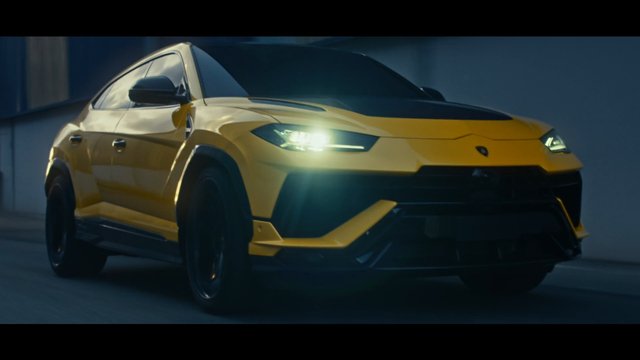 Video Reference: SUV, yellow car, sports car, luxury vehicle, driving, headlights, automotive, modern design, front view, motion, indoor, sleek, performance, vehicle, transportation