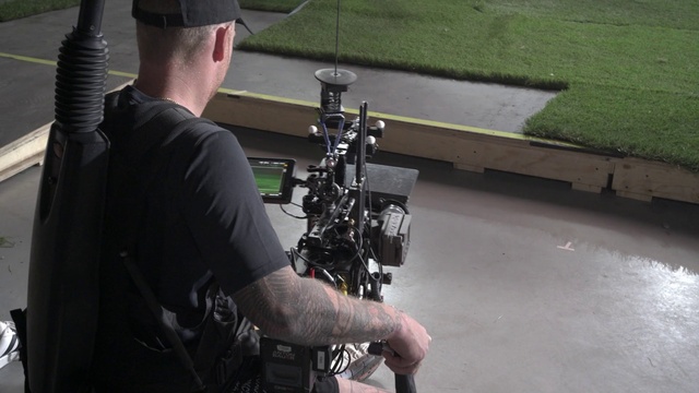 Video Reference: Videographer, Cap, Television crew, Cameras & optics, Baseball cap, Film crew, Cinematographer, Camera operator, Video camera, Engineering