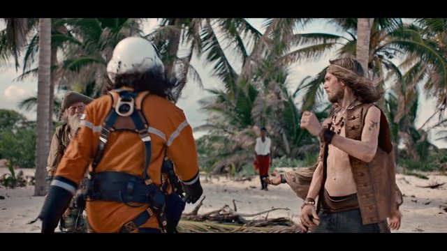 Video Reference: beach, palm trees, tropical, men, outdoors, orange suit, helmet, rugged clothing, standing, conversation, sand, island, adventure, scene, daylight