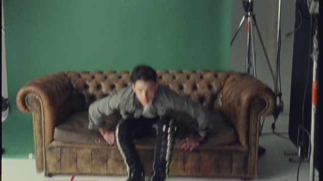 Video Reference: Couch, Furniture, Comfort, Wood, studio couch, Living room, Flooring, Thigh, Hardwood, Sofa bed