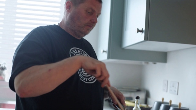 Video Reference: Arm, Muscle, Kitchen appliance, Sleeve, Gesture, Television, Kitchen stove, Elbow, Kitchen, Kitchen utensil